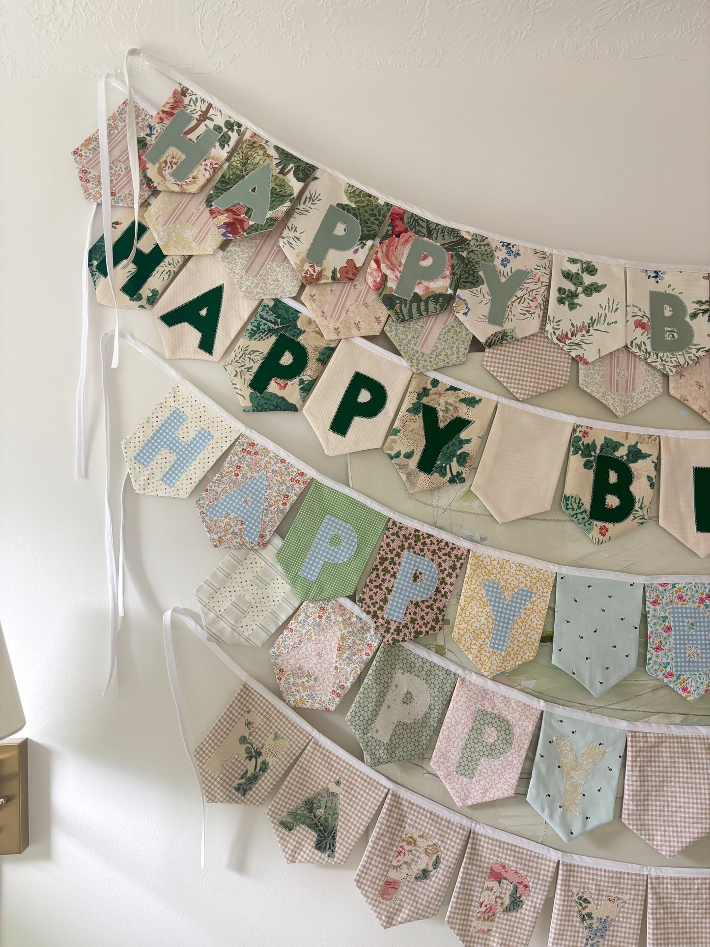HAPPY BIRTHDAY BANNER - ASSORTED FLAGS W/ BLUE GINGHAM LETTERS